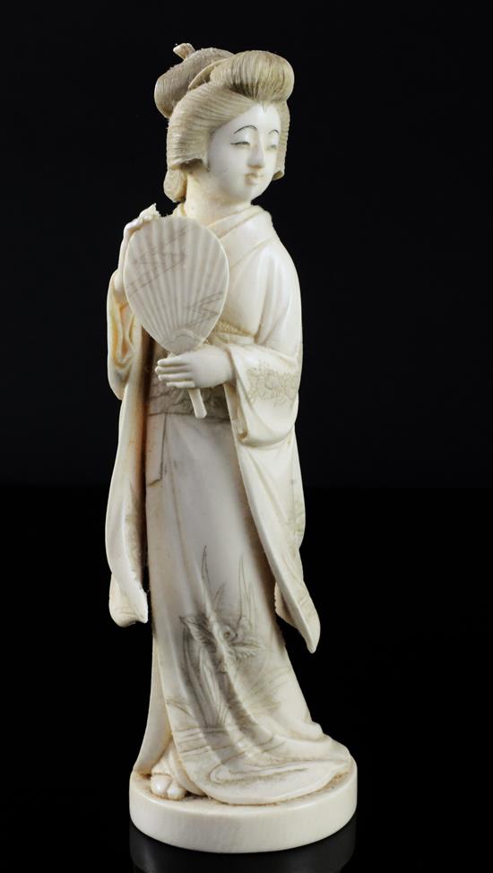 A Japanese ivory figure of a bijin, early 20th century, 19.7cm